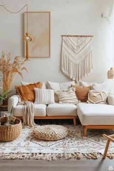 a living room filled with lots of furniture and decor on top of a white rug