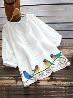 Linen Blouse Outfit, Fabric Paint Shirt, Saree Painting Designs, Colourful Birds, Fabric Paint Diy, Painted Clothes Diy, Hand Painted Dress, Fabric Painting On Clothes, Dress Painting