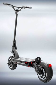 an electric scooter is shown with wheels and spokes on the front wheel