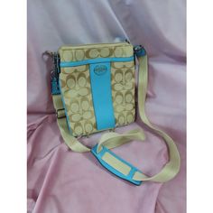 Color Cream Body W/ Eggshell Blue Leather Details Coach Crossbody Canvas Bag. Main Pocket Accessible By Zipper, With Two Smaller Slip-In Pockets In Front And Back. Main Compartment Lined With Matching Blue Fabric. Adjustable Crossbody Strap. Strap Detaches On One Side As Well. Condition Never Used, Nwot, Black Ink Stain On Bottom Corner (See Picture For Details) **Non-Smoking/Pet Friendly Home (1 Hypoallergenic Dog, 1 Cat. Pets Have No Access To Items)** Casual Beige Coach Shoulder Bag, Trendy Beige Coach Bag, Coach Crossbody Bag With Adjustable Strap, Cream Coach Shoulder Bag With Zipper Closure, Multicolor Coach Crossbody Bag, Coach Signature Multicolor Crossbody, Coach Cream Shoulder Bag With Zipper Closure, Blue Coach Bags With Zipper Closure, Blue Coach Bag With Zipper Closure