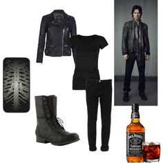 a man wearing black clothes and boots next to a bottle of alcohol, phone case and cellphone