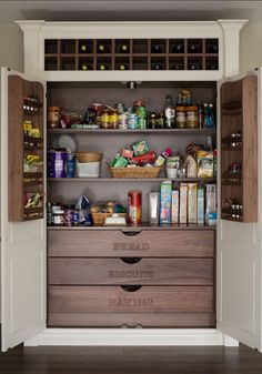 an organized pantry with lots of food in it