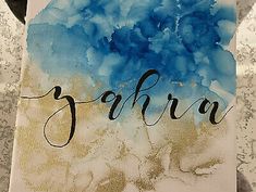 a painting with the word safara written in cursive writing on it