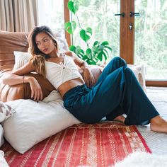 Made from our signature breathable Rayon fabric this casual drawstring pant has an ultrasoft and lightweight feel. Featuring a relaxed fit with a mid-rise elastic drawstring waist and convenient front ✨POCKETS✨, these pants are perfect for the beach or a lazy lounge day! Handmade in Thailand; each pair comes with the photo and story of the artisan who created it. Note: This style runs long. We recommend sizes Small-Extra Large for those 5'6 to 5'10. For those shorter than 5'6, try Petite S/M! Wide-leg Lounge Pants With Drawstring, Wide-leg Drawstring Harem Pants For Loungewear, Loungewear Ankle-length Pants With Tie Waist, Summer Relaxation Sweatpants With Elastic Waistband, Comfortable Casual Pants For Relaxation, Casual Comfortable Pants For Relaxation, Comfortable Summer Sweatpants For Relaxation, Casual Wide Leg Yoga Pants For Relaxation, Casual Relaxed Fit Parachute Pants For Vacation