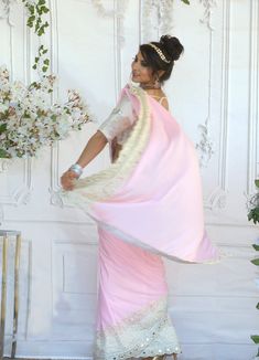 Since time immemorial, pink saree has been a perfect garment that has always reflected a woman’s beauty and elegance! This figure flattering Chiffon saree can be worn as a trendy saree. Fabric & Work Style -- Chiffon saree- Ivory Blouse has beautiful Embossed Print. Size 34-38 Details -- Assured quality.- Wash care instruction: Dry clean only.- Slight variation in color is possible due to digital photography.