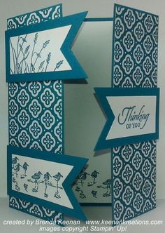 a card with blue and white designs on it