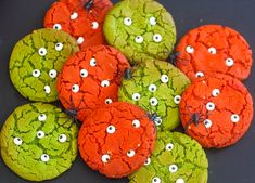 green and orange cookies decorated with googly eyes