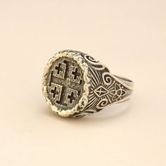 Jerusalem Ring 925 Sterling Silver Handmade Ring The details of Jerusalem Cross were made in order to make it look like carved inside a wood. There's Holy Trinity symbol at the bottom of the sides and a shining Cross above. In the middle sides of the ring, Templar Cross was engraved. The design is open for your customization as you would like... We ship our products with UPS express (within 3-5 days delivery) The production time is 2-3 business days. All sizes are available, please just tell me Antique Carved Sterling Silver Signet Ring, Antique Carved Silver Signet Ring, Holy Trinity Symbol, Ring Men Silver, Trinity Symbol, Christian Ring, Men Silver Ring, Helmet Ring, Freemason Ring