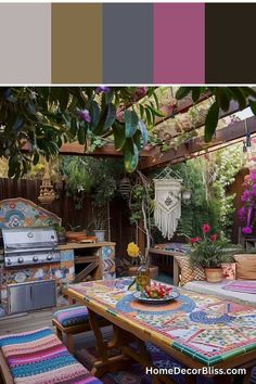 an outdoor dining area with colorful rugs and furniture