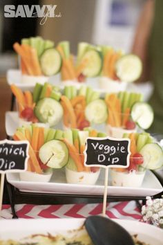 small trays filled with veggie dips on top of a white plate