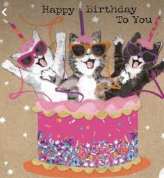 a birthday card with three cats on top of a cake