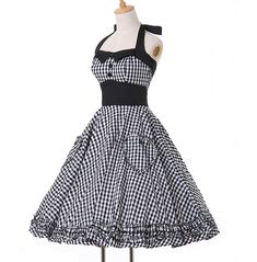 Take a step back in time with our women's black plaid retro swing 60's 50's rockabilly dress. crafted from a blend of polyester and cotton, this dress features vintage & retro fashion that provides a classic look. perfect for special occasions or everyday wear. shop now! Black Fitted A-line Plaid Dress, Retro Fitted Knee-length Plaid Dress, Spring Rockabilly A-line Vintage Dress, Retro Knee-length Dress For Picnic, Retro Knee-length Picnic Dress, Fitted Retro Knee-length Plaid Dress, Fitted Knee-length Retro Plaid Dress, Retro Plaid Dress For Picnic, Rockabilly A-line Vintage Dress