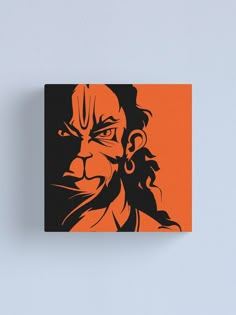 an orange and black drawing of a man's face canvas print