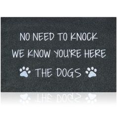 a sign that says, no need to knock we know you're here the dogs