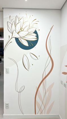 the wall is decorated with an artistic flower design on it's side, and there are two lights in the background