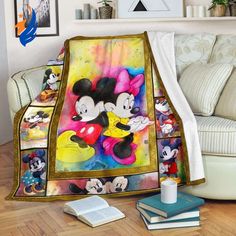 mickey and minnie mouse blanket on the floor