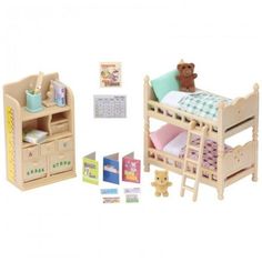 a wooden dollhouse bed and desk with toys