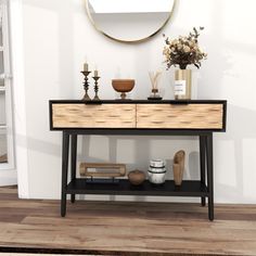 a wooden table with two drawers and a mirror on the wall in front of it