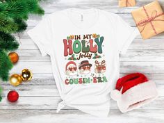 Looking for the perfect shirts for your Christmas cousins? Look no further than our funny christmas cousin shirts. This festive shirt is perfect for pairing with any holiday outfit. Plus, it makes a great gift for anyone who loves spending time with family during the holidays. So don't wait - order your christmas cousin shirt today!                                                       ** IMPORTANT INFO - PLEASE READ**              PLEASE NOTE THERE ARE VARIOUS STYLES AND SIZES AVAILABLE IN LISTING SO PLEASE MAKE SURE YOU HAVE READ THE INFORMATION AND SIZE CHARTS IN PICTURES BEFORE PLACING ORDER. ALSO I USE BOTH BELLA CANVAS AND GILDAN PRODUCTS. BOTH ARE HIGH QUALITY AND SUPER SOFT BUT IF YOU HAVE YOUR OWN PERSONAL PREFERENCE THEN PLEASE LET ME KNOW  * S I Z I N G * ✺ Sizing is unisex  ✺ F Cousin Christmas Shirts Funny, Christmas Vinyl Shirts Cousin, Cousin Shirts Adults, Cousin Christmas Shirts Kids, Best Big Cousin Shirt, Big Cousin Shirt, Cousin Squad, Cousin Shirts, Little Sister Gifts