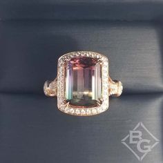 Simon G. 18K Rose Gold Elongated Cushion Watermelon Tourmaline Halo Ring Featuring a 6.61 Natural Watermelon Tourmaline and 0.64 Carats Total Weight of Round Cut Diamonds Set in the Halo and Shank of the ring. Includes ring box Includes jewelry appraisal Ships fully insured to point of delivery Free shipping on this item All orders placed out of NY state (ordered by an out of state resident) are tax free Fine Jewelry With Baguette Cut Tourmaline, Fine Jewelry Tourmaline Baguette Cut, Elongated Cushion, Jewelry Appraisal, Tax Free, Watermelon Tourmaline, Womens Wedding Bands, Shop Engagement Rings, Halo Ring