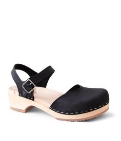 "Loving our Saragasso style? We have more options for you to choose from here: https://www.etsy.com/se-en/listing/578319753/swedish-clogs-for-women-handmade-leather?ref=shop_home_active_2&frs=1 Maybe you would be interested in a higher heel? Then have a look at our style Victoria: https://www.etsy.com/se-en/listing/802261328/swedish-wooden-clogs-for-women-sandgrens?ref=shop_home_active_2&frs=1 Oh, did I hear 50% OFF and don't mind some minor imperfections? Check out our Sandgrens Too sel Classic Summer Clogs With Wooden Heel, Classic Clogs With Wooden Low Heel, Classic Sandals With Wooden Open Heel, Classic Sandals With Wooden Heel And Open Heel Design, Classic Open Toe Mules With Wooden Heel, Classic Open-heel Sandals With Wooden Heel, Sandgrens Clogs, Clogs For Women, Classic Sandals