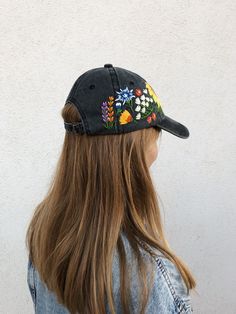 Hand Embroidered Hat is the best gift for her! 🌿 PLEASE NOTE THIS HAT IS READY TO SHIP🌿 Color: a black baseball cap. Design: hand embroidered echinacea with wildflowers. Cap size (head circumference): 55 - 62 cm. GET 10% OFF YOUR 1ST ORDER! Get a 10% off coupon code for our Etsy shop by signing up to our mailing list eepurl.com/gefZy5 CHECK OUR OTHER ACCESSORIES 🌸More Baseball hats: https://www.etsy.com/shop/KazkovaEmbroidery?ref=seller-platform-mcnav&section_id=25392998 🌿Kids Baseball h Embroidered Cotton Hat As Gift, Embroidered Adjustable Trucker Hat, Embroidered Snapback Hat As Gift, Embroidered Snapback Hat As A Gift, Embroidered Black Hats As Gifts, Embroidered Multicolor Cap, Spring Embroidered Hat For Gift, Multicolor Embroidered Cap, Embroidered Flower Baseball Cap, One Size