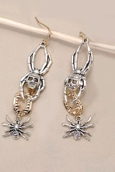 Get tangled up in the spirit of Halloween with our Spider Drop Earrings! These creepy-crawly accessories are the perfect addition to your spooky ensemble. Featuring intricately designed spider charms dangling from your ears, these earrings are sure to weave a web of intrigue wherever you go. Embrace the eerie vibes and make a statement this Halloween. Titanium Post:Hypoallergenic postSurgical steel postLightweight postDurable post Product Details:length: 2.25"width: .75" earring back: Fish Hookm Halloween Novelty Drop Earrings Jewelry, Halloween Novelty Drop Earrings, Novelty Drop Earrings For Halloween, Halloween Themed Dangle Jewelry, Halloween Themed Pierced Jewelry, Pierced Themed Jewelry For Halloween, Witch Hat Earrings, Wizard Hat, Earrings Halloween