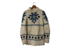 "Vintage Crochet Acrylic Knit Snowflake Pullover Sweater Mock Neck White Blue Women's. Would look great with jeans or with slacks. ☆ SIZE:  Appears to fit a Women's Small.  Please see measurements for fit. ☆ MEASUREMENTS (inches, item lying flat): ✄ Length: 27 1/2\" ✄ Width (armpit to armpit): 18\" ✄ Arms (armpit seam to cuff): 17 1/2\" ☆ COLOR: White Blue ☆ MATERIAL: Unknown most likely and Acrylic Knit or Blend ☆ BRAND: Unknown, handmade vintage  ☆ CONDITION: This item is vintage with signs of Christmas Crochet Sweater, Knit Snowflake, Loose Knit Jumper, Irish Knitwear, Pink Turtleneck Sweater, Alpaca Wool Sweater, Knit Alpaca, Sweater Crochet Pattern, Fair Isle Sweater