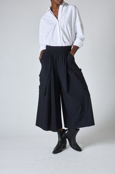 These cargo skirt pants are a fresh take on the current military cargo pants. Pair this gorgeous draped styling piece with a basic white tee for an easy weekend look, or the All Day Washable Silk blouse for a fashion-forward evening look. Click here for Petite Sizes Baggy Chic Cargo Bottoms, Chic Baggy Bottoms With Cargo Pockets, Chic Baggy Cargo Style Bottoms, Workwear Bottoms With Multiple Pockets For Spring, Summer Cargo Pants With Side Pockets For Workwear, Spring Workwear Bottoms With Multiple Pockets, Bottoms With Multiple Pockets For Work, Spring, Fall Cargo Skirt For Work With Multiple Pockets, Summer Workwear Cargo Skirt With Side Pockets