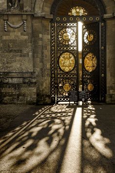 the shadow of a person standing in front of an open door