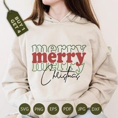 a woman wearing a merry sweater with the words christmas on it and a tag attached to her hoodie