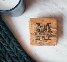 a wooden coaster sitting on top of a table