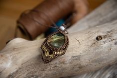 This beautiful macrame necklace made of brown yarn, with a beautiful labradorite, a bright pearl and gold elements is looking forward to a new home! My jewelry is hand-knotted with love and heart and all pieces are unique. This necklace impresses with its color combination and is perfect for lovers of unusual necklaces. Unusual Necklaces, Brown Yarn, Unusual Necklace, Macrame Necklace, Color Combination, Labradorite, Charm Necklace, Hippie Boho, My Jewellery