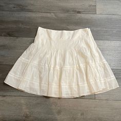 Brand: Madewell Style: Lined Skirt A0363, Side Zipper, Crotched Details Size: 14 Waist: 17" Laying Flat Length: 20" Color: White Fabric: 100% Cotton Shell And Lining Flowy Tiered Mini Skirt With Pleated Waist, Summer Daywear Pleated Tiered Skirt, Summer Daywear Tiered Pleated Skirt, Summer Tiered Pleated Skirt For Daywear, Summer Tiered Mini Skirt With Pleated Waist, Summer Off-white Tiered Skirt, Summer Off White Tiered Skirt, Spring Off-white Tiered Skirt, Off White Tiered Skirt For Summer