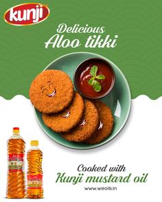 two bottles of ketchup and some cookies on a plate with the words delicious aloo tiki