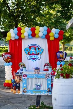 a paw patrol birthday party with balloons and decorations