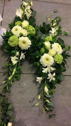 flowers laid out on the ground to be arranged