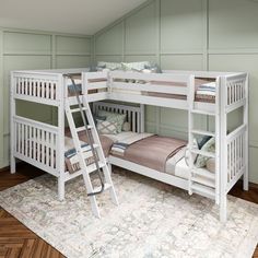 a bunk bed with two sets of ladders on the top and bottom bunk beds