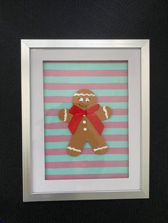 a gingerbread cut out in a frame