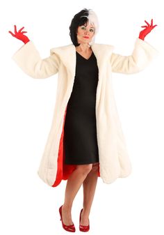 a woman in a white coat and black dress is holding her arms out with both hands