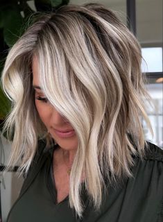 Blonde shoulder length waves curl