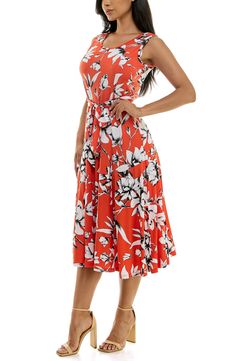 A vibrant printed midi dress is perfect for summer events. Fit: this style fits true to size. 50" length (size Medium) Crewneck Sleeveless Attached waist tie 95% polyester, 5% spandex Machine wash cold Imported Model stats: 5'10", 32" bust, 25" waist, 36" hip. Model is wearing size Medium. Sleeveless Midi Dress, Summer Events, Printed Midi Dress, Midi Dress Sleeveless, Bright Orange, Waist Tie, Nordstrom Rack, Midi Dress, Nordstrom