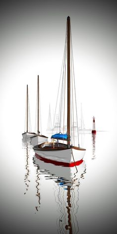 three sailboats floating in the water on a foggy day with one red and white boat