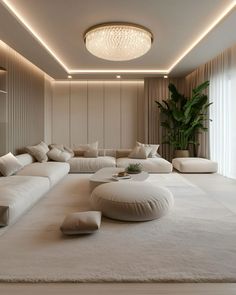 a modern living room with white furniture and large plants on the wall behind the couch