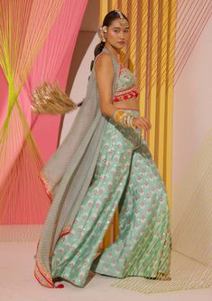 Editor's Note Step into the world of contemporary fashion with these gorgeous coordinate printed panel pants. The vibrant mix of strong floral butta and geometric jaal, delicately enhanced with... Green Anarkali Set With Sheer Dupatta For Summer, Summer Green Anarkali Set With Sheer Dupatta, Green Anarkali Set For Summer Festivities, Green Anarkali Set For Summer Festive Occasion, Summer Festive Green Anarkali Set, Green Designer Anarkali Set For Summer, Summer Designer Green Anarkali Set, Summer Festive Green Sharara, Anarkali Pant Set With Mirror Work For Festivals