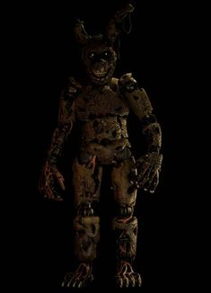 a creepy looking creature standing in the dark