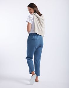 DESCRIPTION Elevate your casual wear with the Raw Edge Lounge Pant in Denim by White & Co. The Label. These lounge pants are designed for ultimate comfort and style, featuring a relaxed fit with a drawstring waist and raw edge hem. The soft denim colour adds a modern touch, while the large front pockets provide both practicality and a chic look. Perfect for lounging at home or running errands, these French Terry pants will become your go-to for effortless, laid-back style. Pair the Raw Edge Loun Comfortable Straight Leg Bottoms With Drawstring, Relaxed Fit Mid-rise Pants With Drawstring, Relaxed Fit Mid-rise Drawstring Pants, Mid-rise Relaxed Fit Pants With Drawstring, Relaxed Fit Straight Leg Joggers, Casual Dark Wash Relaxed Fit Bottoms, Everyday Tapered Leg Sweatpants With Drawstring, Straight Leg Relaxed Fit Sweatpants For Elevated Casual, Casual Straight Leg Sweatpants With Drawstring