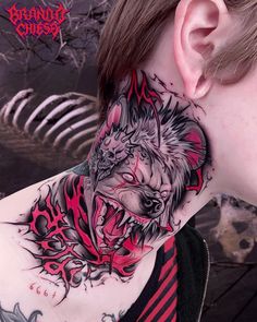 a woman with tattoos on her neck and behind her ear is an image of a wolf