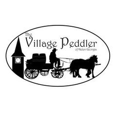 the village peddler logo with horse and buggy on it's side