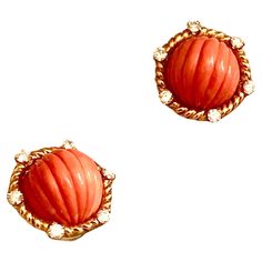 Simple but extremely elegant earrings. Main stone is carved fluted Sciacca Mediterranean coral of a warm lush orange tonality. Very well carved, of even color throughout and well matched. The gems are set within a rope twisted 18kt gold halo. This border with six nicely sized brilliant fiery white diamonds. This is some of the prettiest coral I’ve had in a while. The earrings are secured with a clip back. Judging from the style and quality of the material I think these beautiful pair date from s David Webb, Rope Twist, Mabe Pearl, Gold Clips, Coral And Gold, Gold Halo, Green Enamel, Clip Earrings, Rock Crystal